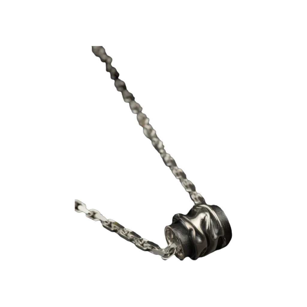 K.AND. barrel pendant in oxidised 925 silver on a silver chain