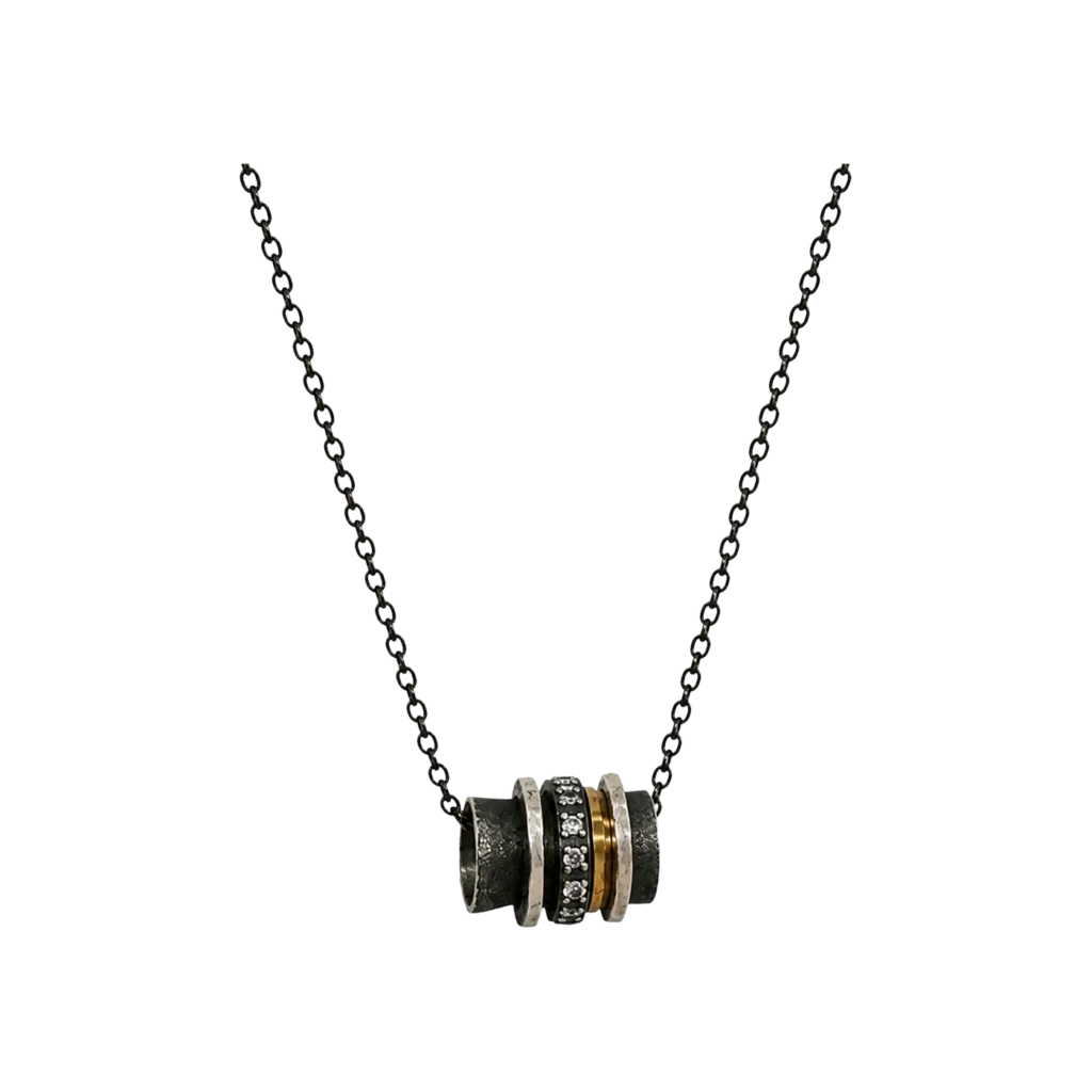 K.AND. oxidised barrel pendant with 18K gold ring on a black chain