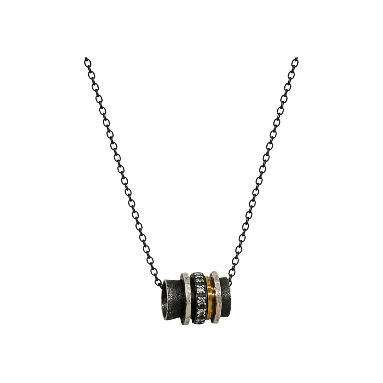 K.AND. oxidised barrel pendant with 18K gold ring on a black chain